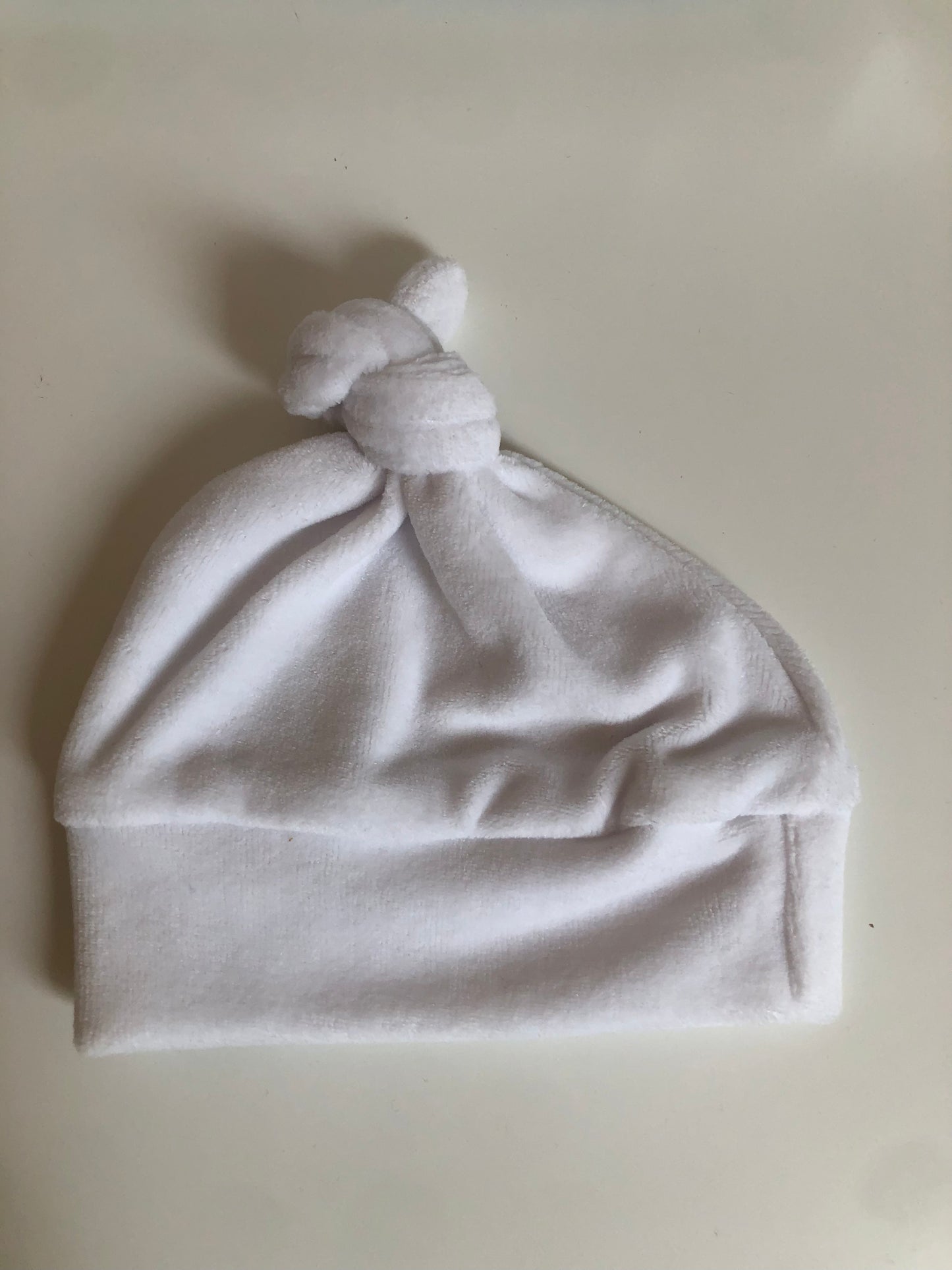Muts teddy wit • Feathers